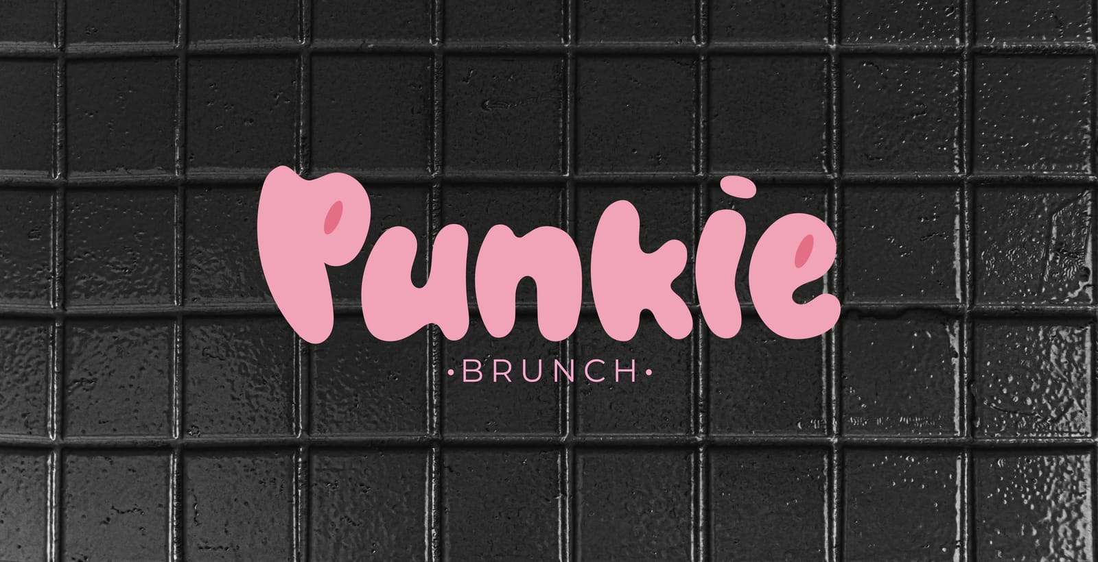 Logotipo de Punkie sobre azulejo negro